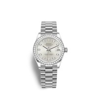 Rolex Datejust 31 President com pulseira em ouro branco e mostrador prateado.