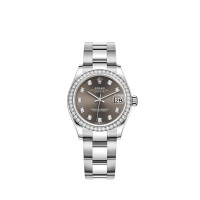 Rolex Datejust 31 em Rolesor branco, mostrador cinza escuro e pulseira Oyster. Rolex Datejust 31 em Rolesor branco, mostrador cinza escuro e pulseira Oyster.
